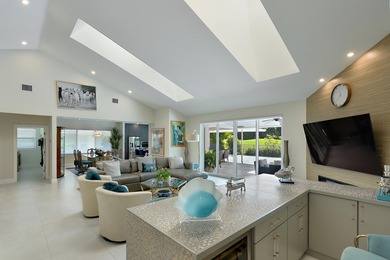 This elegantly remodeled contemporary pool home is located in on Boca Grove Golf and Tennis in Florida - for sale on GolfHomes.com, golf home, golf lot