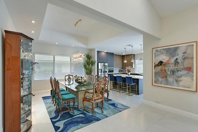 This elegantly remodeled contemporary pool home is located in on Boca Grove Golf and Tennis in Florida - for sale on GolfHomes.com, golf home, golf lot