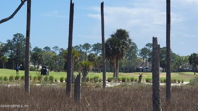 Views, views, views! The golf and nature vistas from this custom on Marsh Landing Country Club - Saint Johns County in Florida - for sale on GolfHomes.com, golf home, golf lot