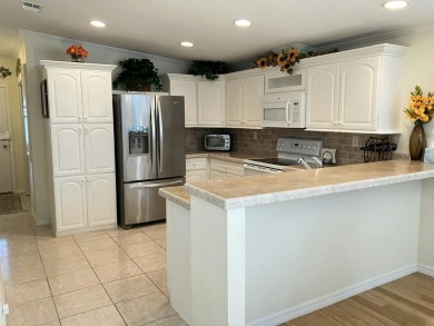 Beautiful 2BR/2BA + den with stunning golf course views! Enjoy on Fairways Country Club in Florida - for sale on GolfHomes.com, golf home, golf lot
