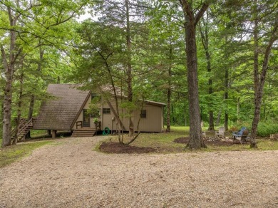 Welcome to your perfect weekend escape. This cozy chalet sits on on Innsbrook Resort Golf Course in Missouri - for sale on GolfHomes.com, golf home, golf lot