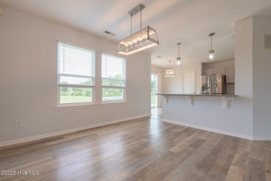 Don't miss out on this spacious home in the sought after Eagle on Eagle Creek Golf Club and Grill in North Carolina - for sale on GolfHomes.com, golf home, golf lot