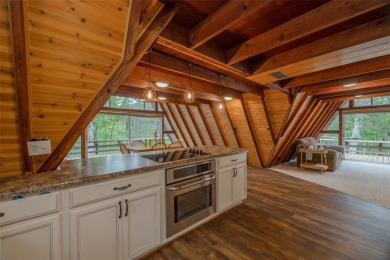 Welcome to your perfect weekend escape. This cozy chalet sits on on Innsbrook Resort Golf Course in Missouri - for sale on GolfHomes.com, golf home, golf lot