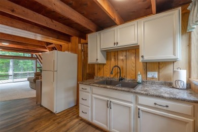 Welcome to your perfect weekend escape. This cozy chalet sits on on Innsbrook Resort Golf Course in Missouri - for sale on GolfHomes.com, golf home, golf lot