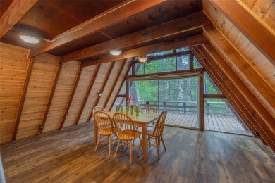 Welcome to your perfect weekend escape. This cozy chalet sits on on Innsbrook Resort Golf Course in Missouri - for sale on GolfHomes.com, golf home, golf lot