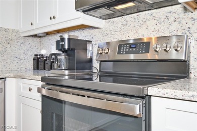 Breathtaking lake and golf course views from this 2 bedroom Golf on Lexington Country Club in Florida - for sale on GolfHomes.com, golf home, golf lot