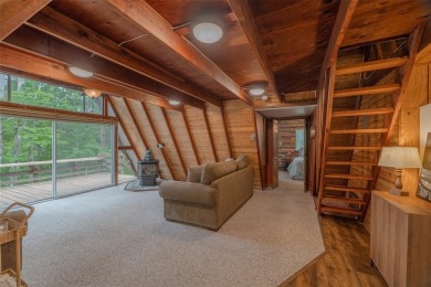 Welcome to your perfect weekend escape. This cozy chalet sits on on Innsbrook Resort Golf Course in Missouri - for sale on GolfHomes.com, golf home, golf lot