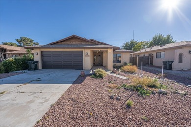 This beautifully maintained home offers the perfect blend of on Cerbat Cliffs Golf Course in Arizona - for sale on GolfHomes.com, golf home, golf lot