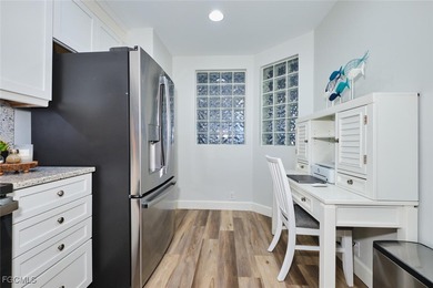 Breathtaking lake and golf course views from this 2 bedroom Golf on Lexington Country Club in Florida - for sale on GolfHomes.com, golf home, golf lot