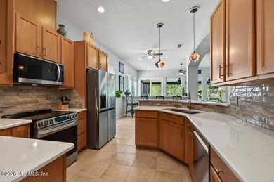 Enjoy breathtaking water views from your backyard - a true on Cimarrone Golf and Country Club in Florida - for sale on GolfHomes.com, golf home, golf lot