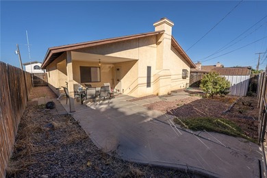 This beautifully maintained home offers the perfect blend of on Cerbat Cliffs Golf Course in Arizona - for sale on GolfHomes.com, golf home, golf lot