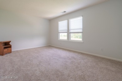 Don't miss out on this spacious home in the sought after Eagle on Eagle Creek Golf Club and Grill in North Carolina - for sale on GolfHomes.com, golf home, golf lot