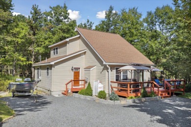 Discover your dream lakeside escape with this stunning Pocono on Pinecrest Lake Golf and Country Club in Pennsylvania - for sale on GolfHomes.com, golf home, golf lot