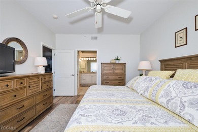 Breathtaking lake and golf course views from this 2 bedroom Golf on Lexington Country Club in Florida - for sale on GolfHomes.com, golf home, golf lot