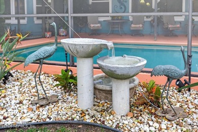 Enjoy breathtaking water views from your backyard - a true on Cimarrone Golf and Country Club in Florida - for sale on GolfHomes.com, golf home, golf lot