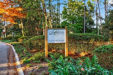 Enjoy breathtaking water views from your backyard - a true on Cimarrone Golf and Country Club in Florida - for sale on GolfHomes.com, golf home, golf lot