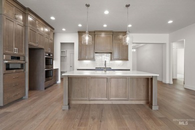Welcome home to this stunning, single-level retreat that offers on Falcon Crest Golf Club in Idaho - for sale on GolfHomes.com, golf home, golf lot