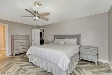 Step into this beautifully reimagined Cape Coral residence where on Palmetto-Pine Country Club in Florida - for sale on GolfHomes.com, golf home, golf lot