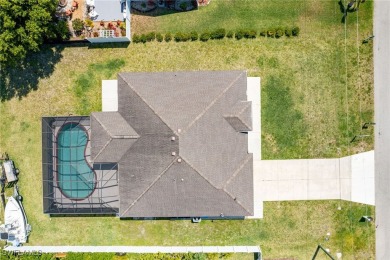 Step into this beautifully reimagined Cape Coral residence where on Palmetto-Pine Country Club in Florida - for sale on GolfHomes.com, golf home, golf lot
