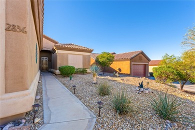 Nestled within the ultra-exclusive, guard-gated enclave of on Laughlin Ranch Golf Club in Arizona - for sale on GolfHomes.com, golf home, golf lot