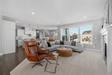 Discover refined living in this former NIH Custom Builders on Rush Creek Golf Club in Minnesota - for sale on GolfHomes.com, golf home, golf lot