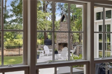 Experience luxury living in this stunning custom-built home on Savannah Quarters Country Club in Georgia - for sale on GolfHomes.com, golf home, golf lot