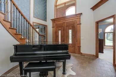 Welcome to 23790 Point O Woods Court, a beautifully designed on River Bank Golf Course in Michigan - for sale on GolfHomes.com, golf home, golf lot