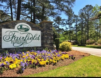 Welcome to resort-style living in the gated lake and golf on Fairfield Plantation Golf and Country Club in Georgia - for sale on GolfHomes.com, golf home, golf lot