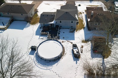 This beautifully maintained 4-bedroom, 2-bath tri-level home is on Lakes of the Four Seasons Country Club in Indiana - for sale on GolfHomes.com, golf home, golf lot