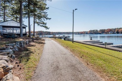 Welcome to resort-style living in the gated lake and golf on Fairfield Plantation Golf and Country Club in Georgia - for sale on GolfHomes.com, golf home, golf lot