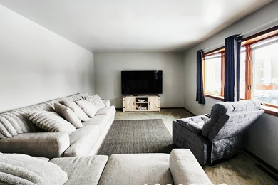 This beautifully maintained 4-bedroom, 2-bath tri-level home is on Lakes of the Four Seasons Country Club in Indiana - for sale on GolfHomes.com, golf home, golf lot