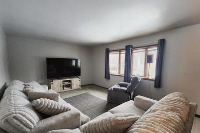 This beautifully maintained 4-bedroom, 2-bath tri-level home is on Lakes of the Four Seasons Country Club in Indiana - for sale on GolfHomes.com, golf home, golf lot