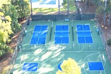 Welcome to resort-style living in the gated lake and golf on Fairfield Plantation Golf and Country Club in Georgia - for sale on GolfHomes.com, golf home, golf lot