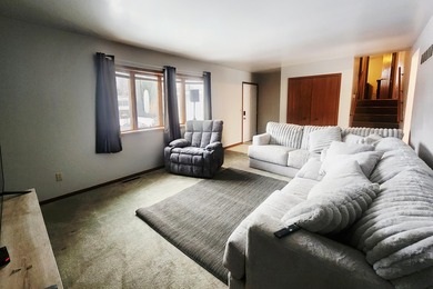 This beautifully maintained 4-bedroom, 2-bath tri-level home is on Lakes of the Four Seasons Country Club in Indiana - for sale on GolfHomes.com, golf home, golf lot