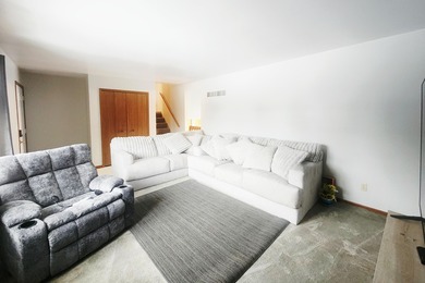 This beautifully maintained 4-bedroom, 2-bath tri-level home is on Lakes of the Four Seasons Country Club in Indiana - for sale on GolfHomes.com, golf home, golf lot