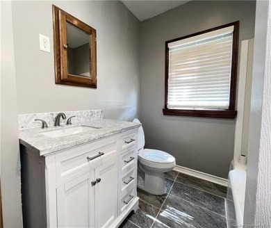 Tucked away just a couple of blocks from the SPAR Complex and on Frasch Park Golf Course in Louisiana - for sale on GolfHomes.com, golf home, golf lot