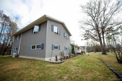 This captivating home on the bluff in Gladstone, located under on Terrace Bluff Golf Course in Michigan - for sale on GolfHomes.com, golf home, golf lot