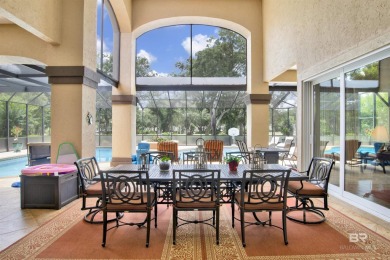 Welcome to this stunning 4-bedroom, 3.5-bathroom residence on Peninsula Golf and Racquet Club in Alabama - for sale on GolfHomes.com, golf home, golf lot