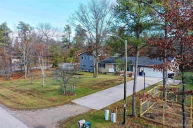 This captivating home on the bluff in Gladstone, located under on Terrace Bluff Golf Course in Michigan - for sale on GolfHomes.com, golf home, golf lot