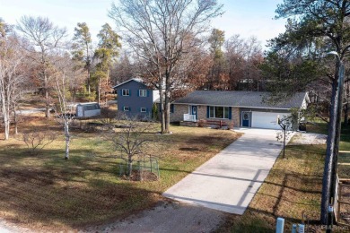 This captivating home on the bluff in Gladstone, located under on Terrace Bluff Golf Course in Michigan - for sale on GolfHomes.com, golf home, golf lot