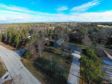 This captivating home on the bluff in Gladstone, located under on Terrace Bluff Golf Course in Michigan - for sale on GolfHomes.com, golf home, golf lot