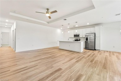 This beautifully situated FIRST FLOOR END unit carriage home in on Highland Woods Golf and Country Club in Florida - for sale on GolfHomes.com, golf home, golf lot