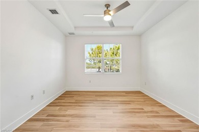 This beautifully situated FIRST FLOOR END unit carriage home in on Highland Woods Golf and Country Club in Florida - for sale on GolfHomes.com, golf home, golf lot