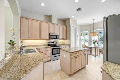 Stunning FURNISHED end unit villa in desirable Aquarina Beach & on Aquarina Beach and Country Club in Florida - for sale on GolfHomes.com, golf home, golf lot