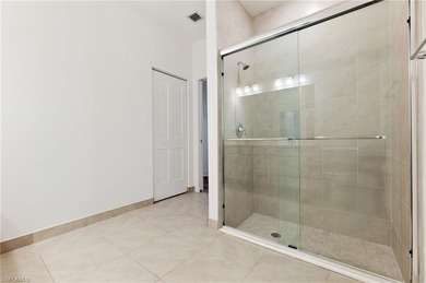 This beautifully situated FIRST FLOOR END unit carriage home in on Highland Woods Golf and Country Club in Florida - for sale on GolfHomes.com, golf home, golf lot