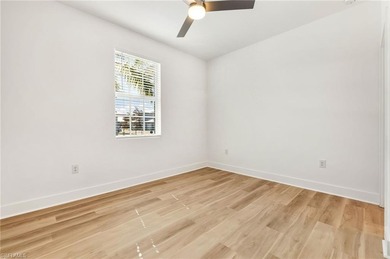 This beautifully situated FIRST FLOOR END unit carriage home in on Highland Woods Golf and Country Club in Florida - for sale on GolfHomes.com, golf home, golf lot