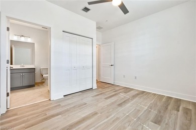 This beautifully situated FIRST FLOOR END unit carriage home in on Highland Woods Golf and Country Club in Florida - for sale on GolfHomes.com, golf home, golf lot