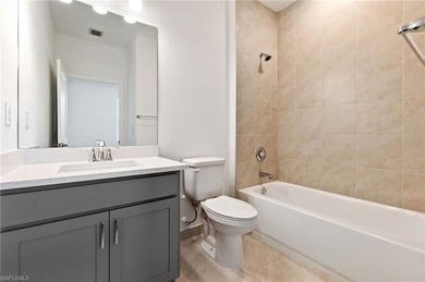 This beautifully situated FIRST FLOOR END unit carriage home in on Highland Woods Golf and Country Club in Florida - for sale on GolfHomes.com, golf home, golf lot