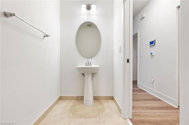 This beautifully situated FIRST FLOOR END unit carriage home in on Highland Woods Golf and Country Club in Florida - for sale on GolfHomes.com, golf home, golf lot