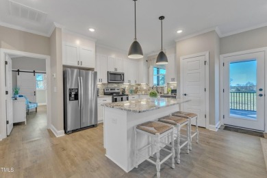 This beautifully UPGRADED like-new home on an acre lot is only on Kerr Lake Country Club in North Carolina - for sale on GolfHomes.com, golf home, golf lot